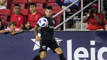 WASHINGTON, DC - AUGUST 19: D.C. United midfielder Luciano Acosta (10) controls a high pass during a MLS match between D.C. United and the New England Revolution, on August 19, 2018, at Audi Field, in Washington D.C.D.C. United defeated the New England Revolution 2-0.(Photo by Tony Quinn/Icon Sportswire via Getty Images)