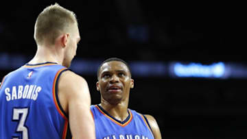 Nov 14, 2016; Auburn Hills, MI, USA; Oklahoma City Thunder guard Russell Westbrook (0) talks to forward Domantas Sabonis (3) during the fourth quarter against the Detroit Pistons at The Palace of Auburn Hills. Pistons won 104-88. Mandatory Credit: Raj Mehta-USA TODAY Sports