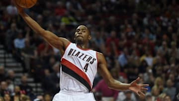 Oct 31, 2015; Portland, OR, USA; Portland Trail Blazers forward Maurice Harkless (4) keeps the ball inbounds during the second quarter against the Phoenix Suns in the Moda Center at the Rose Quarter. Mandatory Credit: Godofredo Vasquez-USA TODAY Sports