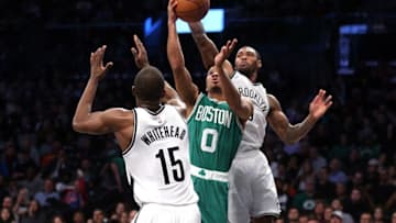 Nov 23, 2016; Brooklyn, NY, USA; Boston Celtics shooting guard Avery Bradley (0) is blocked by Brooklyn Nets shooting guard Sean Kilpatrick (6) in front of Brooklyn Nets point guard Isaiah Whitehead (15) during the fourth quarter at Barclays Center. Mandatory Credit: Brad Penner-USA TODAY Sports