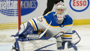 Jan 18, 2022; Ottawa, Ontario, CAN; Buffalo Sabres goalie Michael Houser (32) defends the goal in the second period against the Ottawa Senators at the Canadian Tire Centre. Mandatory Credit: Marc DesRosiers-USA TODAY Sports