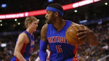 Jan 8, 2014; Toronto, Ontario, CAN; Detroit Pistons forward Josh Smith (6) comes down with a rebound against the Toronto Raptors during the first half at the Air Canada Centre. Mandatory Credit: John E. Sokolowski-USA TODAY Sports