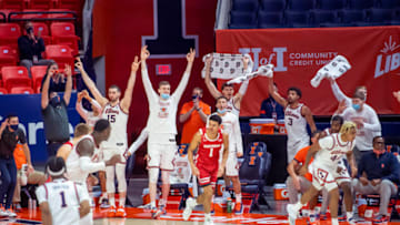Feb 6, 2021; Champaign, Illinois, USA; The Illinois Fighting Illini bench celebrates a three point during the second half against the Wisconsin Badgers at State Farm Center. Mandatory Credit: Patrick Gorski-USA TODAY Sports