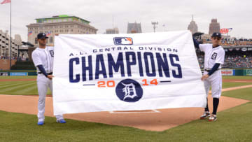 DETROIT, MI - APRIL 06: Anibal Sanchez #19 (L) and Ian Kinsler #3 of the Detroit Tigers hold up the 2014 A.L. Central Division Championship banner prior to the Opening Day game against the Minnesota Twins at Comerica Park on April 6, 2015 in Detroit, Michigan. The Tigers defeated the Twins 4-0. (Photo by Mark Cunningham/MLB Photos via Getty Images)