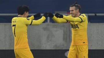 Tottenham Hotspur's South Korean striker Son Heung-Min (L) celebrates scoring the opening goal with his teammate Tottenham Hotspur's Welsh striker Gareth Bale during the UEFA Europa League, last-32 first leg football match Wolfsberger AC v Tottenham Hotspur at the Puskas Arena in Budapest on February 18, 2021. (Photo by Attila KISBENEDEK / AFP) (Photo by ATTILA KISBENEDEK/AFP via Getty Images)
