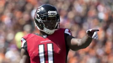Sep 14, 2014; Cincinnati, OH, USA; Atlanta Falcons wide receiver Julio Jones (11) points to the sidelines in the first quarter against the Cincinnati Bengals at Paul Brown Stadium. Mandatory Credit: Aaron Doster-USA TODAY Sports
