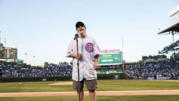 Stefan Xidas sings the national anthem before the Chicago Cubs play the Milwaukee Brewers on Monday, Sept. 10, 2018 at Wrigley Field in Chicago, Ill. Xidas raised $18,000 for the Special Olympics Organization. (Armando L. Sanchez/Chicago Tribune/TNS via Getty Images)