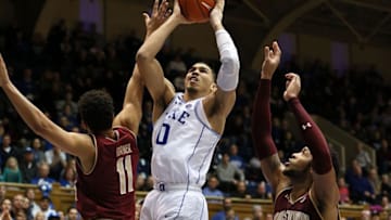Jan 7, 2017; Durham, NC, USA; Duke Blue Devils forward Jayson Tatum (0) drives between Boston College Eagles forward A.J. Turner (11) and forward Mo Jeffers (15) during the second half of their game at Cameron Indoor Stadium. Mandatory Credit: Mark Dolejs-USA TODAY Sports