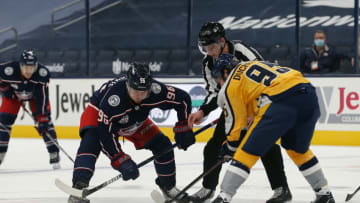 Columbus Blue Jackets center Jack Roslovic (96) wins a faceoff against Nashville Predators center Matt Duchene (95)during the first period at Nationwide Arena. Mandatory Credit: Russell LaBounty-USA TODAY Sports