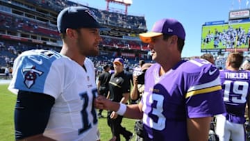 Sep 11, 2016; Nashville, TN, USA; Tennessee Titans quarterback Matt Cassel (16) talks with Minnesota Vikings quarterback Shaun Hill (13) after a Vikings win at Nissan Stadium. The Vikings won 25-16. Mandatory Credit: Christopher Hanewinckel-USA TODAY Sports