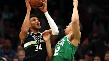 BOSTON, MASSACHUSETTS - MAY 03: Grant Williams #12 of the Boston Celtics defends Giannis Antetokounmpo #34 of the Milwaukee Bucks during the first quarter of Game Two of the Eastern Conference Semifinals at TD Garden on May 03, 2022 in Boston, Massachusetts. NOTE TO USER: User expressly acknowledges and agrees that, by downloading and or using this photograph, User is consenting to the terms and conditions of the Getty Images License Agreement. (Photo by Maddie Meyer/Getty Images)