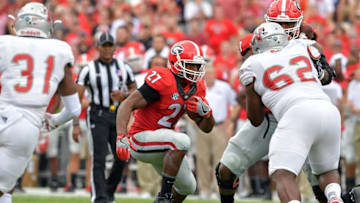 Sep 10, 2016; Athens, GA, USA; Georgia Bulldogs running back Nick Chubb (27) runs the ball against the Nicholls State Colonels during the second half at Sanford Stadium. Georgia defeated Nicholls State 26-24. Mandatory Credit: Dale Zanine-USA TODAY Sports
