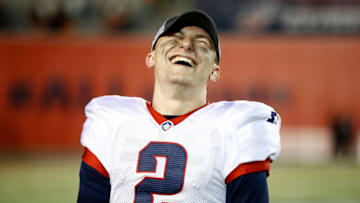 MEMPHIS, TENNESSEE - MARCH 24: Quarterback Johnny Manziel #2 of the Memphis Express laughs as they play the Birmingham Iron during the third quarter of their Alliance of American Football game at Liberty Bowl Memorial Stadium on March 24, 2019 in Memphis, Tennessee. (Photo by Wesley Hitt/AAF/Getty Images)
