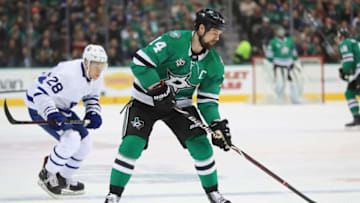 DALLAS, TX - JANUARY 25: Jamie Benn #14 of the Dallas Stars skates the puck against the Toronto Maple Leafs at American Airlines Center on January 25, 2018 in Dallas, Texas. (Photo by Ronald Martinez/Getty Images)