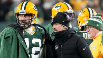 Green Bay Packers quarterback Aaron Rodgers (12) task with head coach Matt LaFleur during the fourth quarter of their game Monday, December 19, 2022 at Lambeau Field in Green Bay, Wis. The Green Bay Packers beat the Los Angeles Rams 24-12.Packers19 5