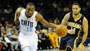 Charlotte Bobcats' Kemba Walker (15) looks for an angle to the basket as Indiana Pacers' D.J. Augustin (14) defends during the second half at Time Warner Cable Arena on Wednesday, January 15, 2013, in Charlotte, North Carolina. The Pacers won 103-76. (David T. Foster III/Charlotte Observer/MCT via Getty Images)