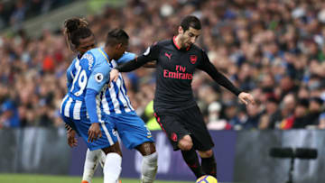 BRIGHTON, ENGLAND - MARCH 04: Jose Izquierdo and Gaetan Bong of Brighton and Hove Albion close down Henrikh Mkhitaryan of Arsenal during the Premier League match between Brighton and Hove Albion and Arsenal at Amex Stadium on March 4, 2018 in Brighton, England. (Photo by Catherine Ivill/Getty Images)
