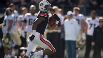 Auburn football wide receiver Darius Slayton (81) runs the ball into the end zone after catching a long pass during the Music City Bowl at Nissan Stadium in Nashville, Tenn., on Friday, Dec. 28, 2018. Auburn defeated Purdue 63-14.Jc Auburnmcb 63