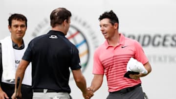 AKRON, OH - AUGUST 05: Zach Johnson and Rory McIlroy of Northern Ireland shake hands during the third round of the World Golf Championships - Bridgestone Invitational at Firestone Country Club South Course on August 5, 2017 in Akron, Ohio. (Photo by Sam Greenwood/Getty Images)