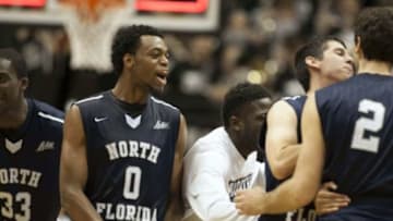 Dec 6, 2014; West Lafayette, IN, USA; North Florida Ospreys guard Jalen Nesbitt (0) and his teammates celebrate their win over Purdue Boilermakers at Mackey Arena. The North Florida Ospreys beat the Purdue Boilermakers by the score of 73-70. Mandatory Credit: Trevor Ruszkowski-USA TODAY Sports