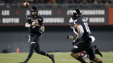 CINCINNATI, OHIO - NOVEMBER 23: Desmond Ridder #9 of the Cincinnati Bearcats throws a pass in the game against the Temple Owls during the second quarter at Nippert Stadium on November 23, 2019 in Cincinnati, Ohio. (Photo by Justin Casterline/Getty Images)