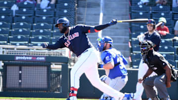 GOODYEAR, ARIZONA - MARCH 01: Franmil Reyes #32 of the Cleveland Indians follows through on a swing against the Kansas City Royals during a spring training game at Goodyear Ballpark on March 01, 2021 in Goodyear, Arizona. (Photo by Norm Hall/Getty Images)