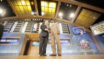 NEW YORK - JUNE 28: Mike Conley (R) shakes hands with NBA Commissioner David Stern after being selected fifth overall by the Boston Celtics during the 2007 NBA Draft at the WaMu Theatre at Madison Square Garden June 28, 2007 in New York, New York. NOTE TO USER: User expressly acknowledges and agrees that, by downloading and or using this photograph, User is consenting to the terms and conditions of the Getty Images License Agreement. Mandatory Copyright Notice: Copyright 2007 NBAE (Photo by Jesse D. Garrabrant/NBAE via Getty Images)
