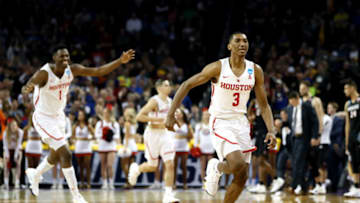 WICHITA, KS - MARCH 15: Armoni Brooks #3 and Chris Harris Jr. #1 of the Houston Cougars celebrate their teams win over the San Diego State Aztecs in the first round of the 2018 NCAA Men's Basketball Tournament at INTRUST Arena on March 15, 2018 in Wichita, Kansas. The Houston Cougars defeated the San Diego State Aztecs 67-65. (Photo by Jamie Squire/Getty Images)