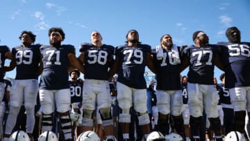 STATE COLLEGE, PA - SEPTEMBER 24: Penn State Nittany Lions players sing the alma mater on the field after the game against the Central Michigan Chippewas at Beaver Stadium on September 24, 2022 in State College, Pennsylvania. (Photo by Scott Taetsch/Getty Images)