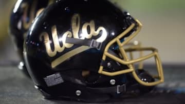 Nov 15, 2013; Pasadena, CA, USA; Washington Huskies metallic helmets on the sidelines during the game against the UCLA Bruins at Rose Bowl. Mandatory Credit: Kirby Lee-USA TODAY Sports