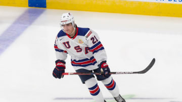 EDMONTON, AB - DECEMBER 25: Brett Berard #21 of the United States skates against Russia during the 2021 IIHF World Junior Championship at Rogers Place on December 25, 2020 in Edmonton, Canada. (Photo by Codie McLachlan/Getty Images)
