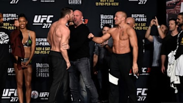 NEW YORK, NY - NOVEMBER 03: (L-R) Michael Bisping of England and Georges St-Pierre of Canada face off during the UFC 217 weigh-in inside Madison Square Garden on November 3, 2017 in New York City. (Photo by Jeff Bottari/Zuffa LLC/Zuffa LLC via Getty Images)