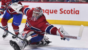 MONTREAL, QC - APRIL 06: Goaltender Charlie Lindgren #39 of the Montreal Canadiens stretches out to protect the net against the Toronto Maple Leafs during the NHL game at the Bell Centre on April 6, 2019 in Montreal, Quebec, Canada. The Montreal Canadiens defeated the Toronto Maple Leafs 6-5 in a shootout. (Photo by Minas Panagiotakis/Getty Images)