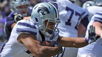 MANHATTAN, KS - April 22: Running back Justin Silmon No. 33 of the Kansas State Wildcats rushes up field during the Purple and White Spring Game on April 22, 2017 at Bill Snyder Family Stadium in Manhattan, Kansas. (Photo by Peter G. Aiken/Getty Images)