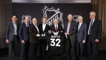 SEA ISLAND, GA - DECEMBER 04: (L to R) Adrian Hanauer, NHL Seattle franchise Vice-Chairman David Wright, Jay Deutsch, Jerry Bruckheimer, NHL Commissioner Gary Bettman, NHL Seattle franchise majority owner David Bonderman, Len Potter, and NHL Seattle franchise President and CEO Tod Leiweke pose for a photo during the NHL Board of Governors Meeting on December 4, 2018 in Sea Island, Georgia. The NHL Board of Governors approved expanding to Seattle, making the franchise the 32nd team in the league. (Photo by Patrick McDermott/NHLI via Getty Images)