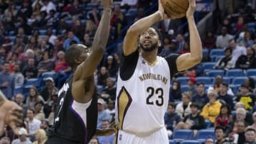 Dec 2, 2016; New Orleans, LA, USA; New Orleans Pelicans forward Anthony Davis (23) controls the ball against LA Clippers forward Luc Mbah a Moute (12) during the second half at the Smoothie King Center. The Clippers defeat the Pelicans 114-96. Mandatory Credit: Jerome Miron-USA TODAY Sports