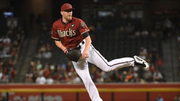 PHOENIX, AZ - AUGUST 02: Jake Diekman #41 of the Arizona Diamondbacks delivers a pitch in the seventh inning of the MLB game agains tthe San Francisco Giants at Chase Field on August 2, 2018 in Phoenix, Arizona. (Photo by Jennifer Stewart/Getty Images)