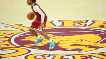 Dec 8, 2021; Cleveland, Ohio, USA; Cleveland Cavaliers guard Darius Garland (10) brings the ball up court in the fourth quarter against the Chicago Bulls at Rocket Mortgage FieldHouse. Mandatory Credit: David Richard-USA TODAY Sports