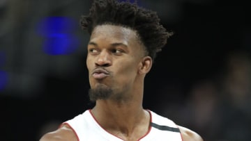 Jimmy Butler #22 of the Miami Heat gives a kiss to the crowd after receiving a technical foul for an argument with T.J. Warren (Photo by Andy Lyons/Getty Images)