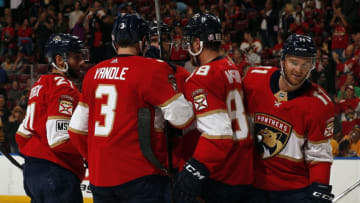 SUNRISE, FL - APRIL 3: Jonathan Huberdeau #11 of the Florida Panthers celebrates his goal with teammates during the first period against the Nashville Predators at the BB&T Center on April 3, 2018 in Sunrise, Florida. (Photo by Eliot J. Schechter/NHLI via Getty Images)