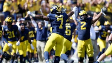 ANN ARBOR, MI - SEPTEMBER 7: Khaleke Hudson #7 of the Michigan Wolverines celebrates after quarterback Kelvin Hopkins Jr. of the Army Black Knights fumbled the ball which was recovered by Michigan during the second overtime to end the game at Michigan Stadium on September 7, 2019 in Ann Arbor, Michigan. (Photo by Duane Burleson/Getty Images)