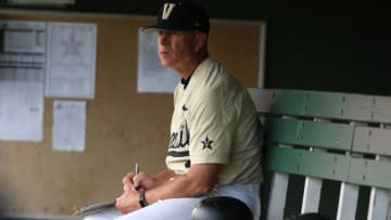 CLEMSON, SC - JUNE 03: Clemson and Vanderbilt met in the afternoon elimination game of the NCAA 2018 Division I Baseball Championship played in Clemson, S.C. on June 3, 2018. Tim Corbin (4) the head coach of Vanderbilt takes notes between innings. (Photo by John Byrum/Icon Sportswire via Getty Images)
