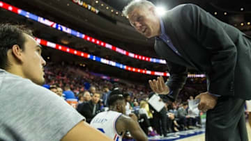 Oct 6, 2016; Philadelphia, PA, USA; Philadelphia 76ers head coach Brett Brown (R) talks with forward Dario Saric (9) during the second quarter against the Washington Wizards at Wells Fargo Center. The Washington Wizards 125-119. Mandatory Credit: Bill Streicher-USA TODAY Sports