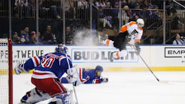 NEW YORK, NEW YORK - MARCH 01: Derek Grant #38 of the Philadelphia Flyers leaps as he gets a pass off a first period pass to Michael Raffl #12 who scores against the New York Rangers at Madison Square Garden on March 01, 2020 in New York City. (Photo by Bruce Bennett/Getty Images)