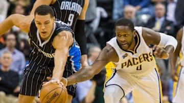 Nov 14, 2016; Indianapolis, IN, USA; Indiana Pacers forward C.J. Miles (0) steals the ball from Orlando Magic forward Aaron Gordon (00) in the second half at Bankers Life Fieldhouse. Indiana Pacers beat the Orlando Magic 88-69. Mandatory Credit: Trevor Ruszkowski-USA TODAY Sports