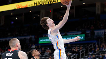 OKC Thunder guard Josh Giddey (3) shoots as Houston Rockets guard Jalen Green (0) (27) looks on : Alonzo Adams-USA TODAY Sports