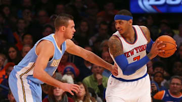 Nov 16, 2014; New York, NY, USA; Denver Nuggets forward Danilo Gallinari (8) defends New York Knicks forward Carmelo Anthony (7) during the second quarter at Madison Square Garden. Mandatory Credit: Anthony Gruppuso-USA TODAY Sports