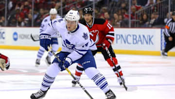 Apr 9, 2016; Newark, NJ, USA; Toronto Maple Leafs defenseman Morgan Rielly (44) skates with the puck during the first period of their game against the New Jersey Devils at Prudential Center. Mandatory Credit: Ed Mulholland-USA TODAY Sports