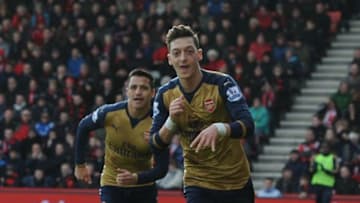 BOURNEMOUTH, ENGLAND - FEBRUARY 07: Mesut Oezil celebrates scoring the first Arsenal goal during the Barclays Premier League match between AFC Bournemouth and Arsenal at The Vitality Stadium on February 7, 2016 in Bournemouth, England. (Photo by Stuart MacFarlane/Arsenal FC via Getty Images)