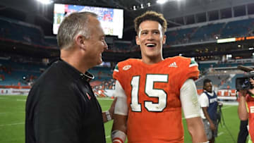 Nov 26, 2016; Miami Gardens, FL, USA; Miami Hurricanes head coach Mark Richt (left) shakes hands with Miami Hurricanes quarterback Brad Kaaya (right) after defeating the Duke Blue Devils 40-21 at Hard Rock Stadium. Mandatory Credit: Steve Mitchell-USA TODAY Sports
